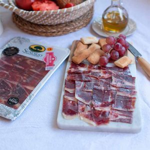 Jamón 100% raza ibérica, etiqueta negra, loncheado, D.O.P. Dehesa de Extremadura, Señorío de Montanera.