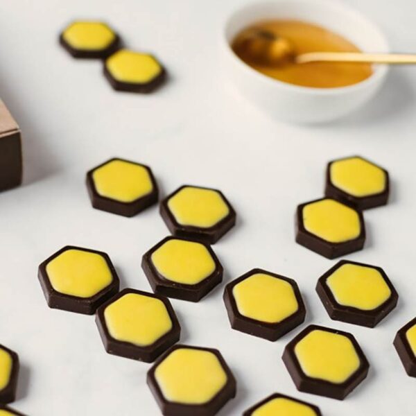 Bee Rooms šokolādes konfektes, pildītas ar medu, Vācija 1879